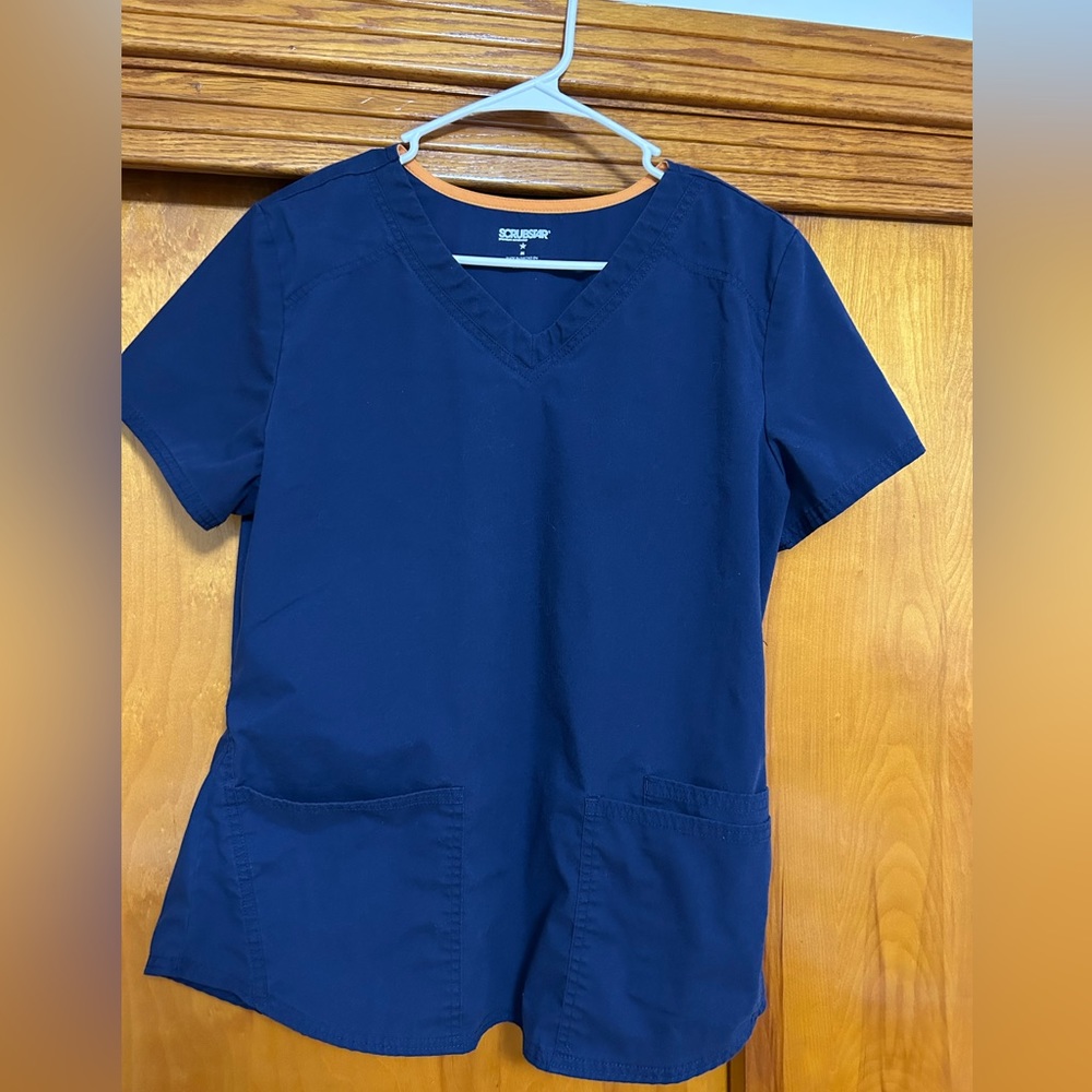 Scrubstar scrub shirt. Royal blue. Size medium.